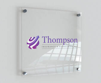 Thompson Insurance & Associates, LLC logo printed on the wall