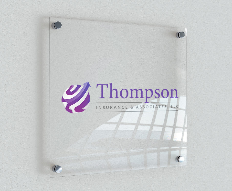 Thompson Insurance & Associates, LLC logo printed on the wall